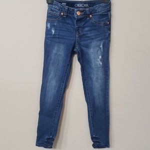 Girls skinny distressed jeans